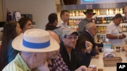 Steven Margolis (center) at at Zabar’s delicatessen in New York